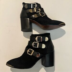 Report Signature Black Ankle Boots with Gold Buckle Accents